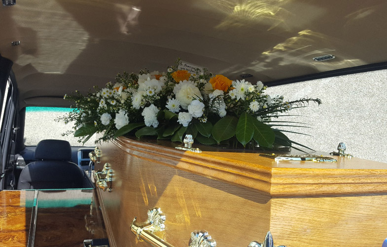 Coffin with Flowers